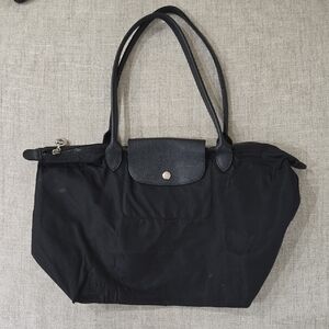Longchamp Black Tote Bag with Leather Handles and Flap Closure